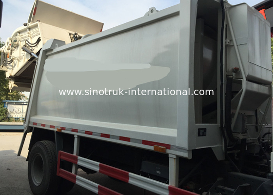 SINOTRUK Truk Pengumpul Sampah Terkompresi 10-12CBM LHD 4X2 ZZ3161M4311