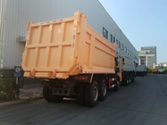 SINOTRUK Heavy Duty Tipper Dump Truck LHD Dengan Kabin Kerangka Kekuatan Tinggi Unilateral Kuning