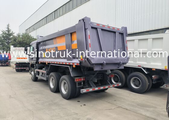 SINOTRUK Heavy Duty Hauler TX Tipper Dump Truck dengan Mesin 380HP, Kapasitas Beban 30-40 Ton dan Tipe Angkat Tengah