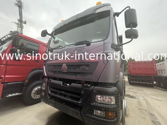 Tugas Berat HOWO TX 8X4 Tipper Truck 400HP Gandar Belakang Ganda 16T Ganda Ganda 9,5T Abu-abu