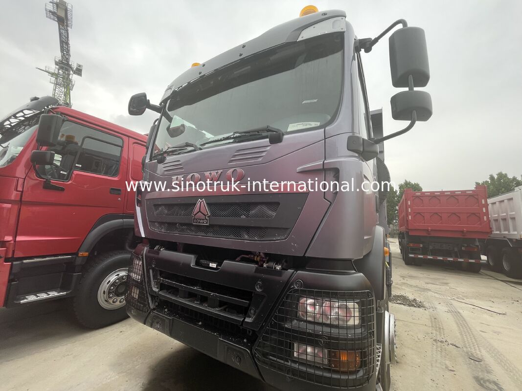 Tugas Berat HOWO TX 8X4 Tipper Truck 400HP Gandar Belakang Ganda 16T Ganda Ganda 9,5T Abu-abu